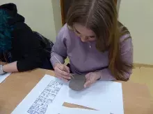 Studenckie Koło Naukowe Archeologii Śródziemnomorskiej UG podczas warsztatów pisma klinowego